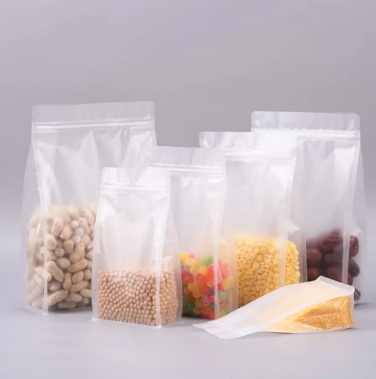 Tùy chỉnh Chất bọc mặt phẳng đáy tám Hạch Transparent Zip Lock Trái cây khô Thực phẩm gạo đóng gói Nhựa đứng lên túi